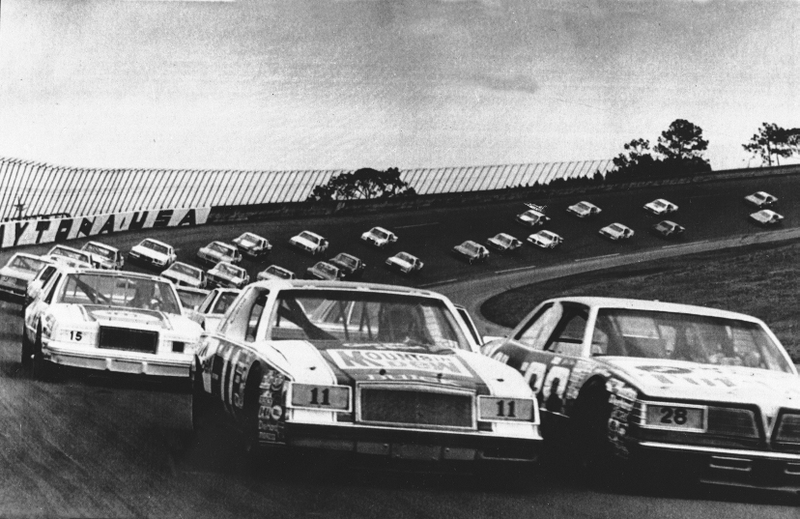 The No. 11 car of Darrell Waltrip starts the 1981 NASCAR season in a Mountain Dew-sponsored race car at Daytona International Speedway. That Daytona 500 kicked off the (unofficial) farewell season for green as a color of bad luck in NASCAR, as Waltrip won 12 races and the championship. Photo credit: AP Photo/Phil Sandlin
